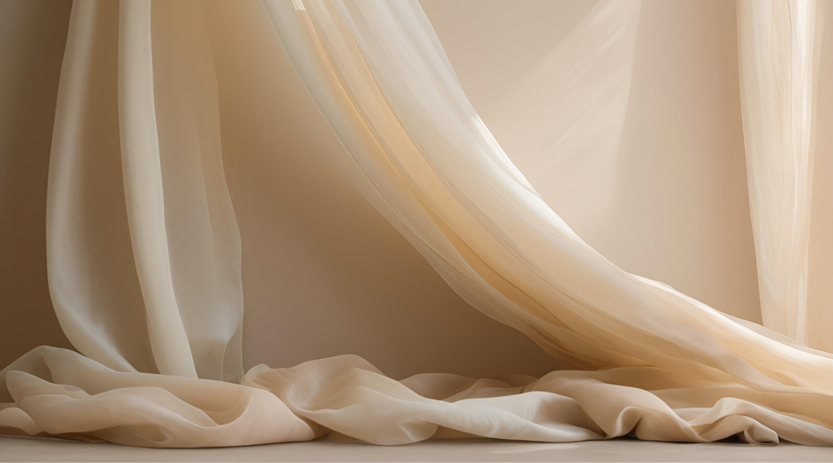 nude colour silk draped over a wall