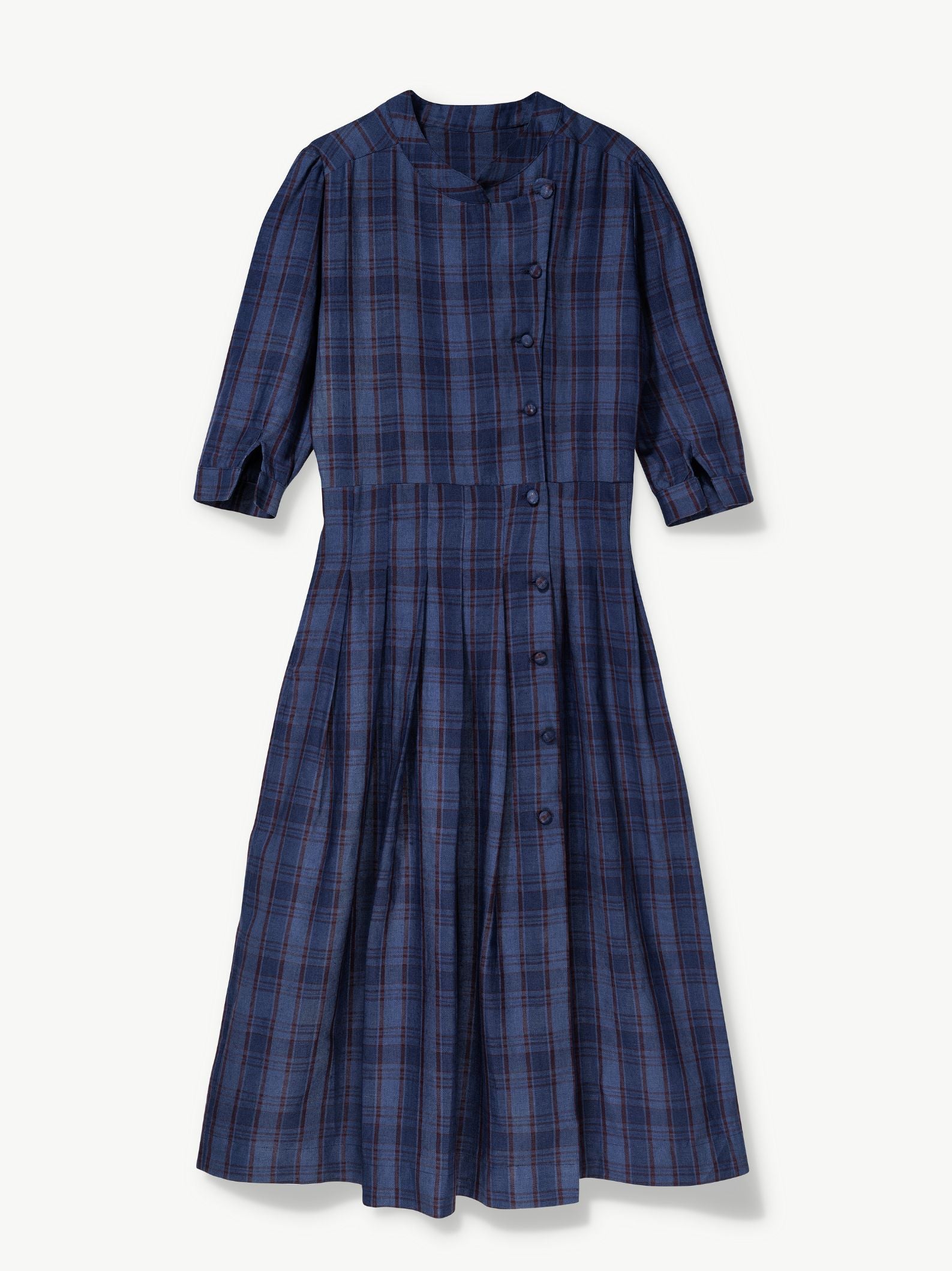 Navy blue plaid dress with side pockets on a white background