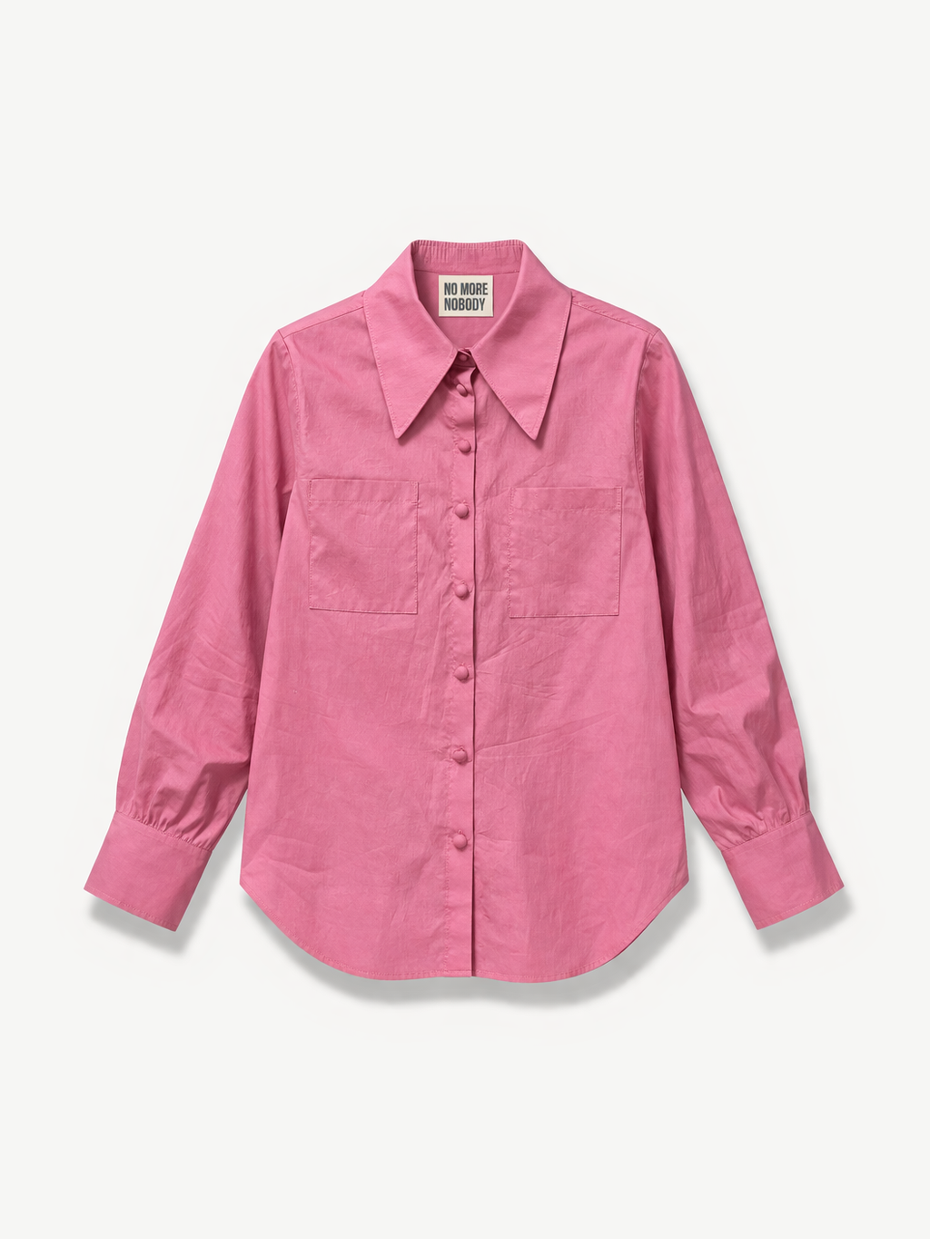 Pink shirt on a light gray background