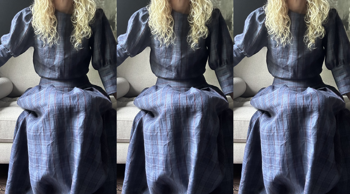 three images of a woman sitting on a cream sofa wearing a navy check skirt and a matching top