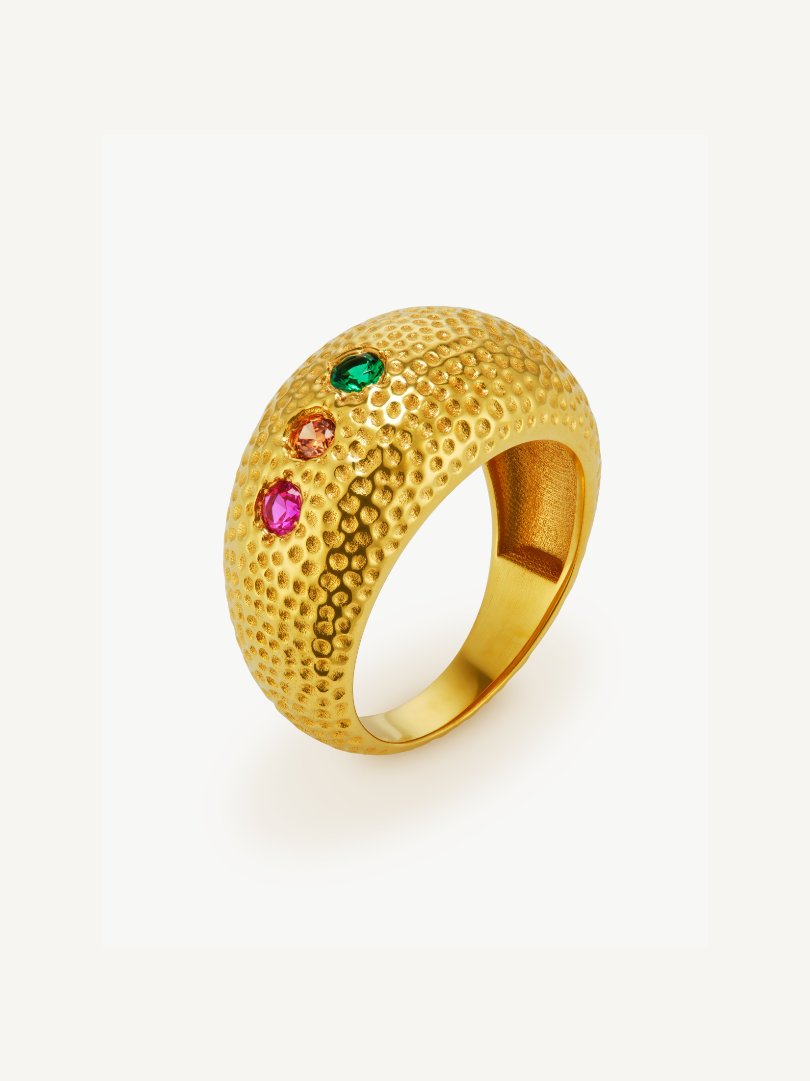gold ring with three small stones 