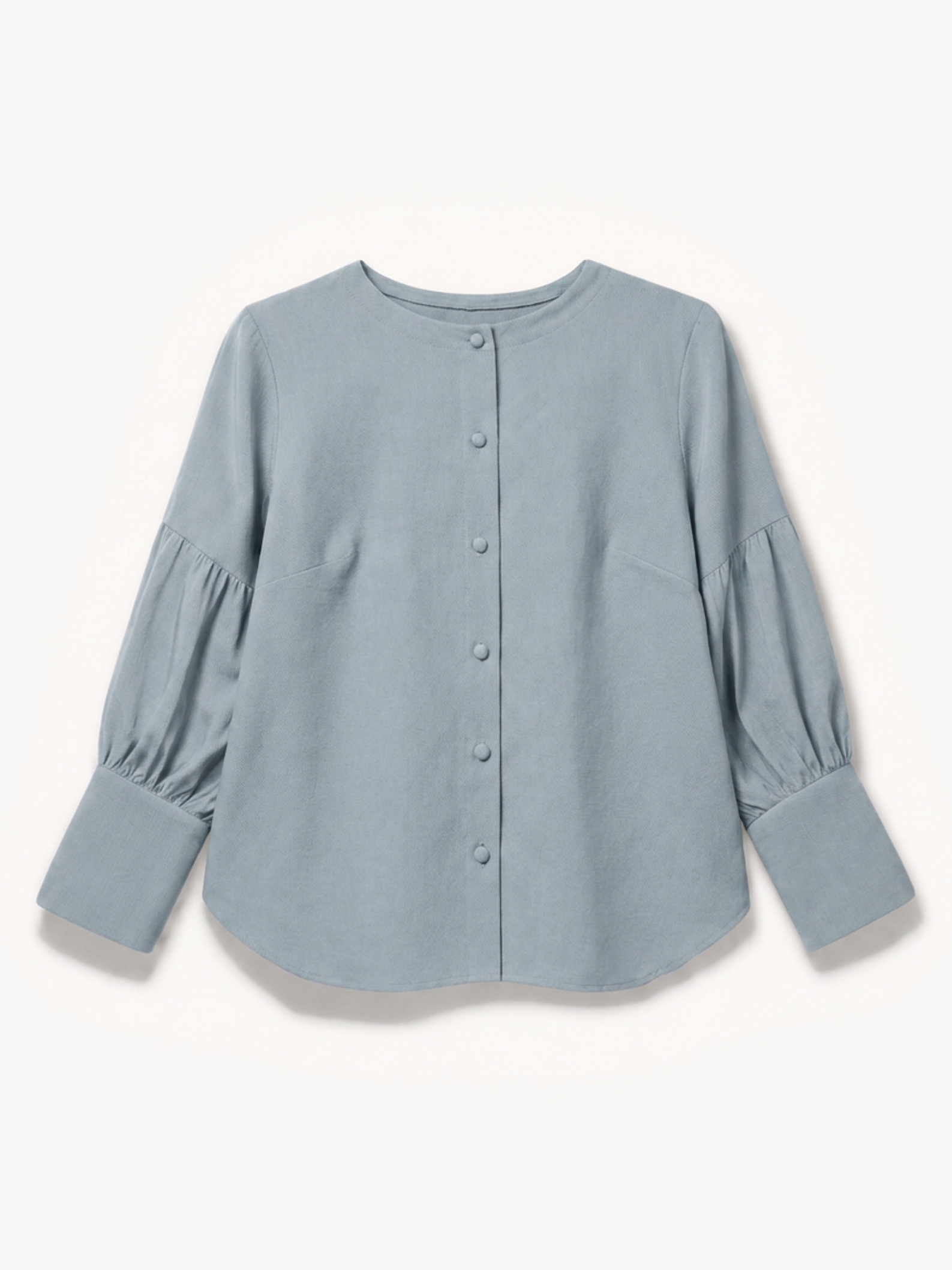 A dusty blue long-sleeve blouse with a button-up front, crew neck, and gathered puff sleeves, shown flat on a light cream background.