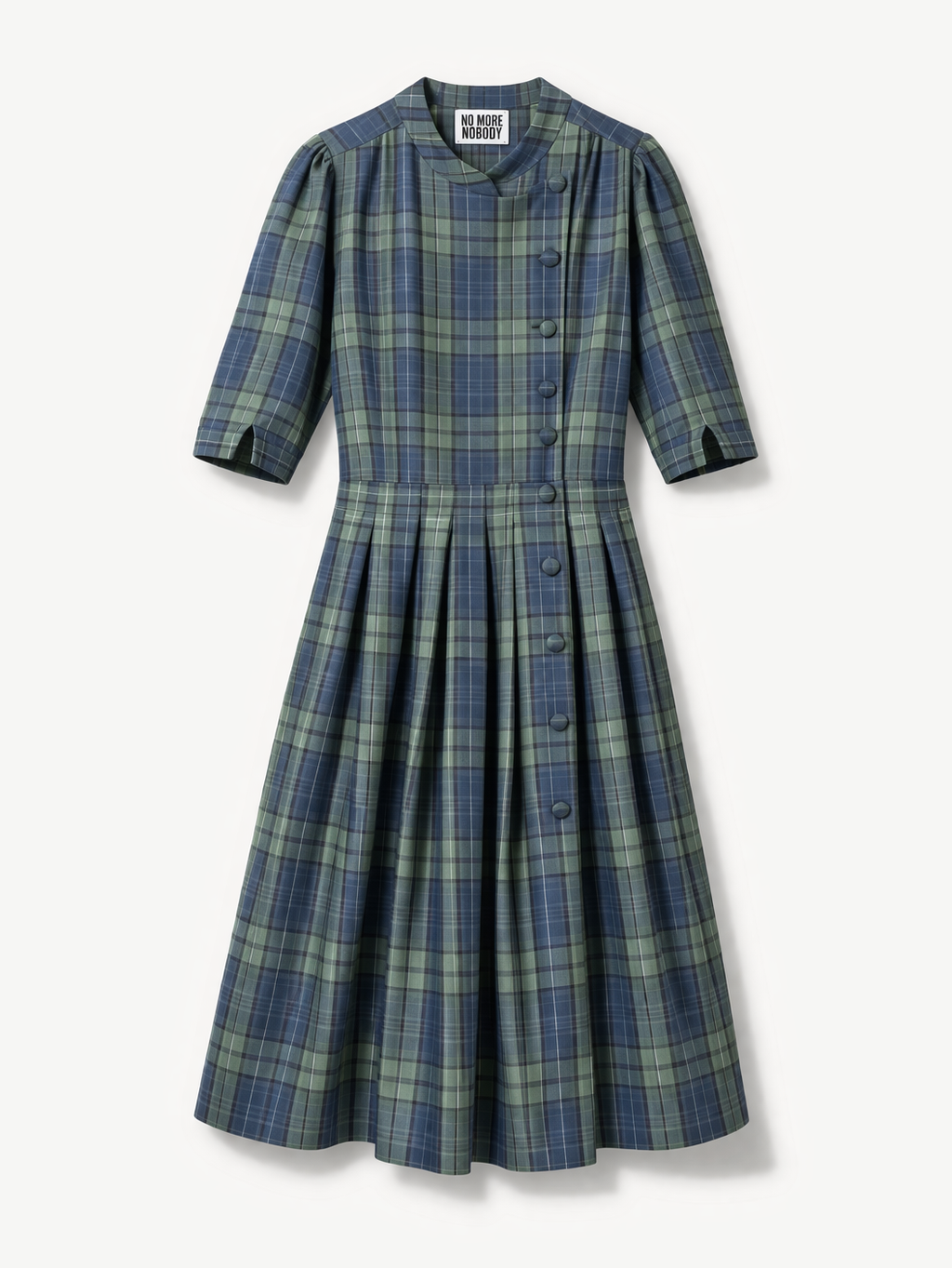 Blue and green plaid dress on a white background